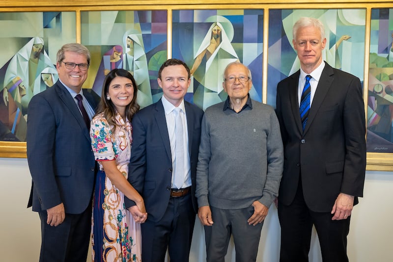 Left to right, Gordon Smith, Ruth and Gary Sine, artist Jorge Cocco and BYU President Kevin Worthen by Cocco’s paintings.