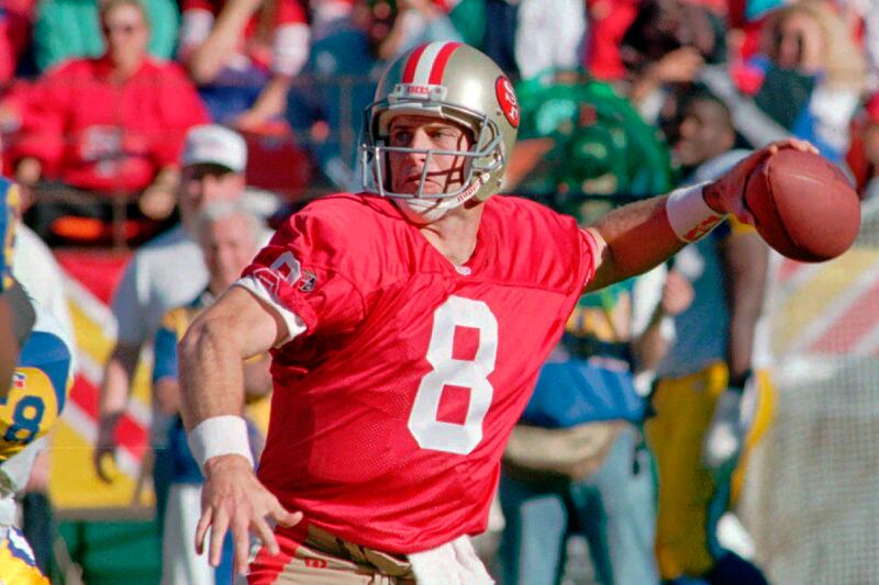 San Francisco 49ers quarterback Steve Young throws against the St. Louis Rams at San Francisco’s 3Com Park Nov. 26, 1995.