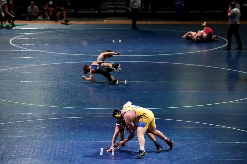 Wrestlers compete at the Ross Brunson Utah High School All-Star Duals at the UCCU Center in Orem on Jan. 10, 2023.