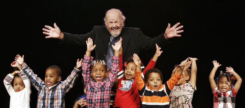 Rev. Sam Mann, shown with kids from the St. Mark Child & Family Development Center, once the head of St. Mark Union Church in Missouri.