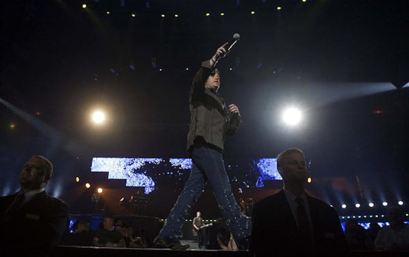 Rascal Flatts' Gary LeVox interacts with the crowd during the country band's concert Friday night at EnergySolutions Arena.