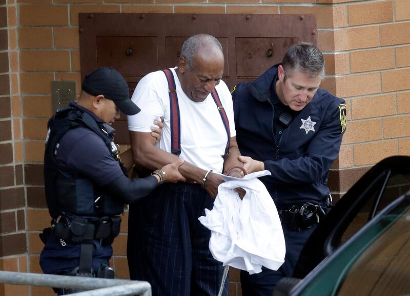 Bill Cosby is escorted out of the Montgomery County Correctional Facility, Tuesday, Sept. 25, 2018, in Eagleville, Pa., after receiving a three-to-10-year prison sentence for sexual assault.