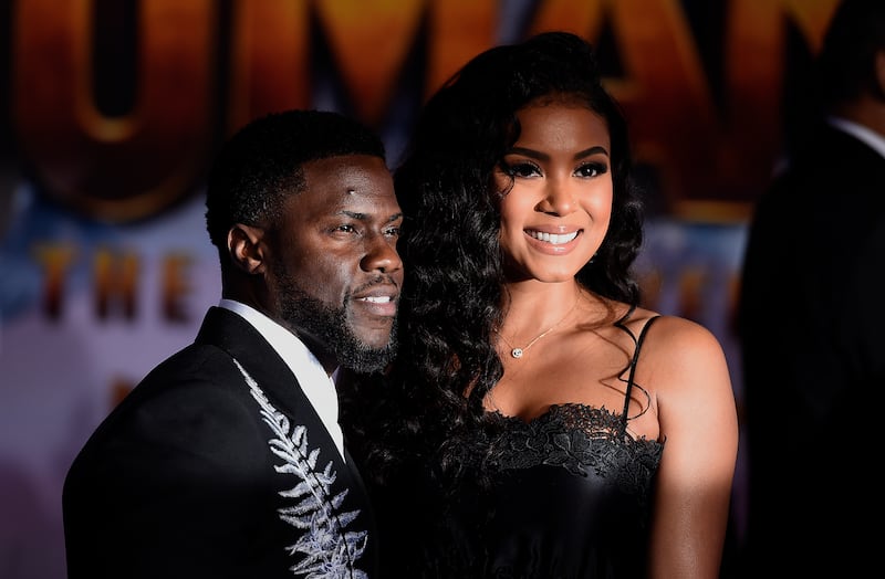 Cast member Kevin Hart, left, and his wife, Eniko Parrish, arrive at the Los Angeles premiere of “Jumanji: The Next Level” at the TCL Chinese Theatre on Monday, Dec. 9, 2019.