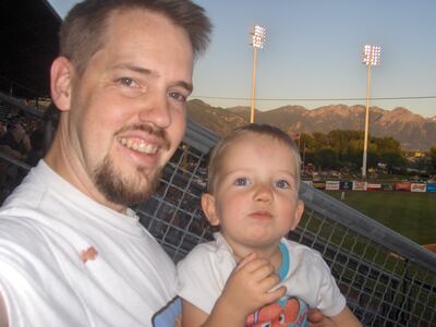 Josh Powell and his second child, Braden Powell, watch a baseball game in Salt Lake City on July 6, 2009. West Valley police recovered this image from a digital camera belonging to Josh Powell that was seized with a search warrant during the investigation