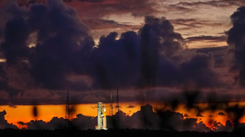 The NASA moon rocket stands ready at sunrise on Pad 39B before the Artemis 1 mission to orbit the moon.
