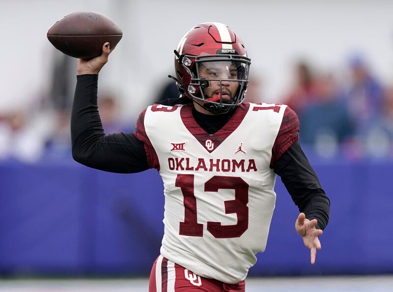 Oklahoma quarterback Caleb Williams passes the ball during an NCAA college football game against Kansas.