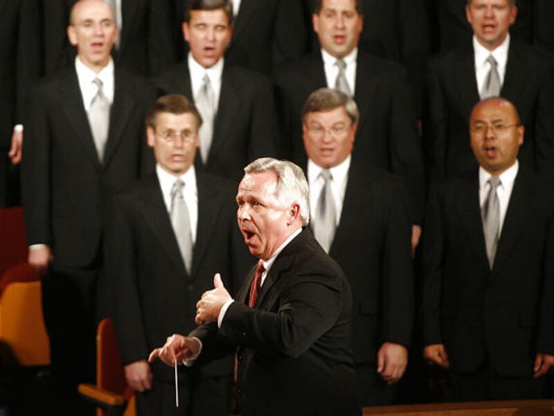 Craig Jessop leads the Mormon Tabernacle Choir during general conference of the LDS Church last year. He resigned last month.