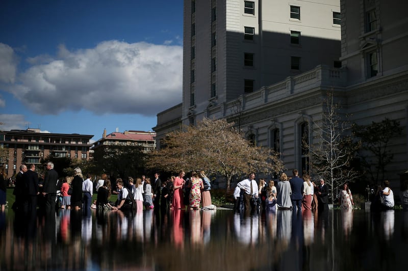 People walk around outside Temple Square after the afternoon session of the LDS Church’s 187th Annual General Conference in Salt Lake City on Saturday, April 01, 2017.