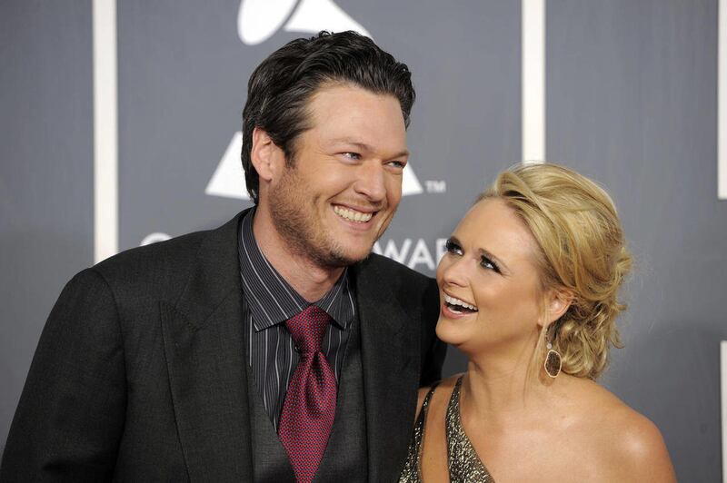 FILE - In this Feb. 13, 2011 file photo, Blake Shelton, left, and Miranda Lambert arrive at the 53rd annual Grammy Awards in Los Angeles.