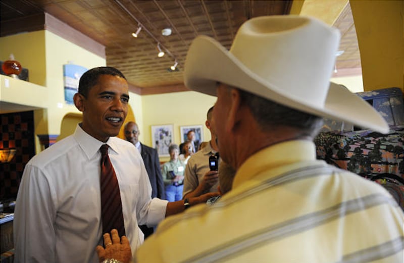 Democratic presidential candidate Sen. Barack Obama, D-Ill., meets with people while making a stop at the Range Cafe in Bernalillo, N.M., on Thursday morning.