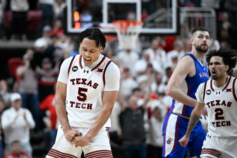 Texas Tech guard Darrion Williams (5) reacts to a score against Kansas during a game on Feb. 12, 2024, in Lubbock, Texas.