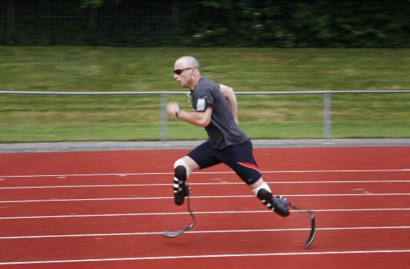 Double-amputee sprinter Oscar Pistorius trains for the Dutch Open Paralympics event in Emmeloord, Netherlands, Friday. The South African wants to qualify for the Beijing Olympics after the Court of Arbitration for Sport ruled that his prosthetic racing bl
