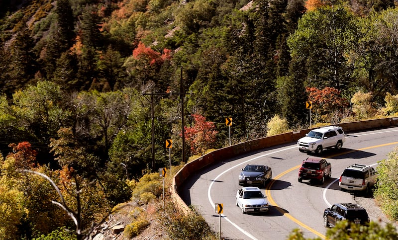 Vehicles drive through Big Cottonwood Canyon in Salt Lake City on Friday, Oct. 1, 2021.