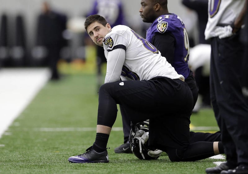 Baltimore Ravens tight end Dennis Pitta looks on during NFL football practice at the team's traning facility in Owings Mills, Md., Thursday, Jan. 24, 2013.