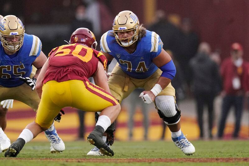 UCLA offensive lineman Sean Rhyan, right, lines up against USC’s Nick Figueroa during game Saturday, Nov. 20, 2021, in Los Angeles.