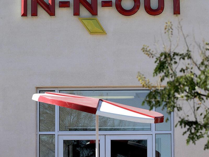 Customers eat at an In-N-Out Burger, Thursday, Jan. 31, 2008, in Tempe, Ariz.