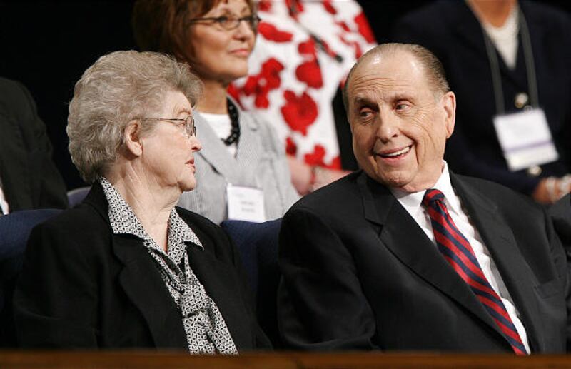 President Thomas S. Monson shares a laugh Friday with his wife, Frances, before addressing the Women's Conference at Brigham Young University.