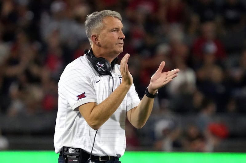 Arizona coach Brent Brennan claps during game against Kansas State, Friday, Sept 12, 2025, in Tucson, Ariz. Brennan and his Wildcats host No. 18 BYU Saturday in Tucson.