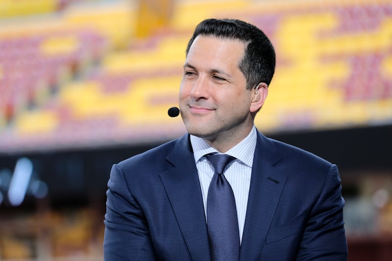 ESPN personality Adam Schefter appears on set prior to an NFL football game between the Chicago Bears and Washington Redskins.