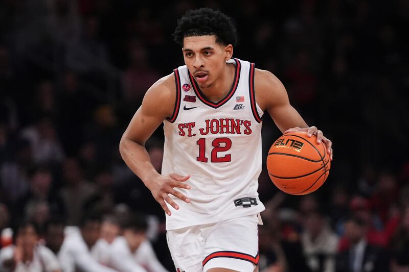 St. John's RJ Luis Jr. (12) looks to pass during game against Creighton March 15, 2025, in New York.
