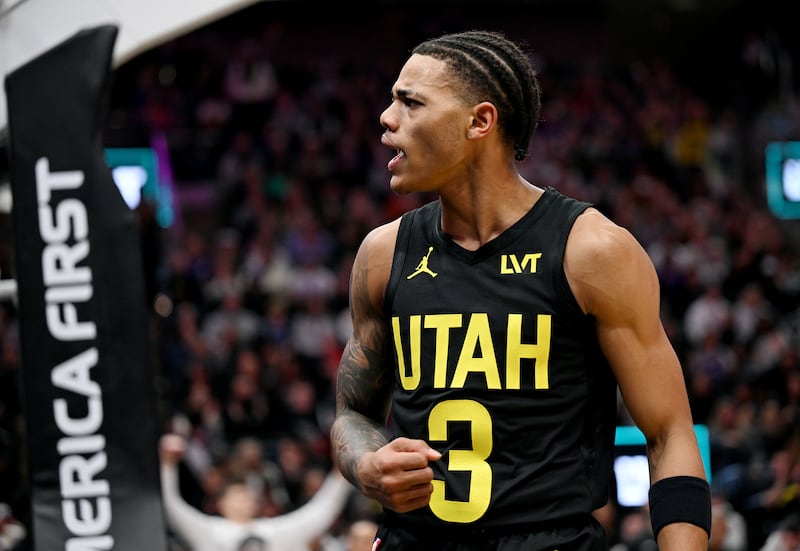 Utah Jazz’s Keyonte George celebrates after a huge dunk as the Jazz and the Suns play at the Delta Center in Salt Lake City.