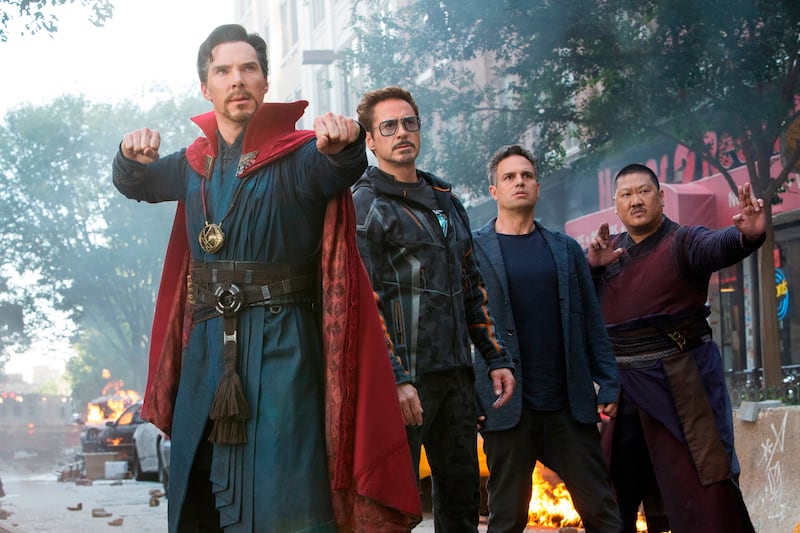 This image released by Marvel Studios shows, from left, Benedict Cumberbatch, Robert Downey Jr., Mark Ruffalo and Benedict Wong in a scene from "Avengers: Infinity War." The supersized superhero hit has crossed $2 billion in worldwide ticket sales, becomi