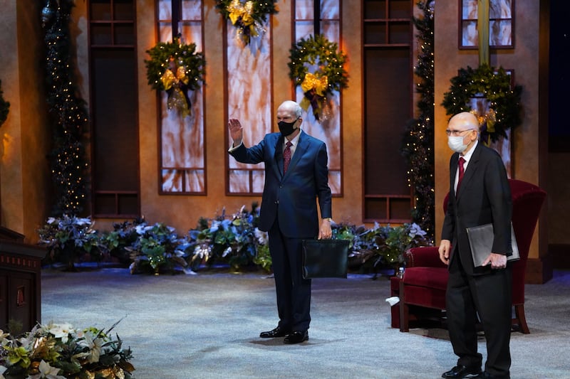 President Russell M. Nelson waves in the Conference Center Theater in Salt Lake City.