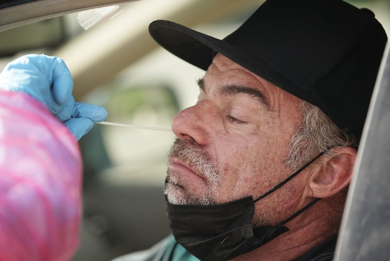 Mark McComb is tested for COVID-19.