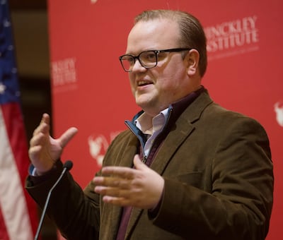 McKay Coppins, a journalist for The Atlantic and BYU graduate, speaks to students at the Hinckley Institute of Politics at the University of Utah in Salt Lake City in 2016.