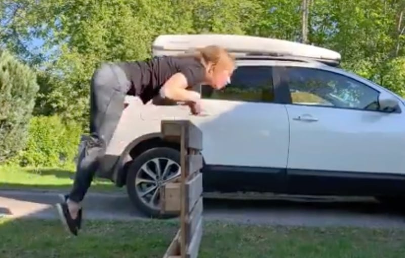 Ayla Kirstine jumps over a wooden pallet in this Instagram video.