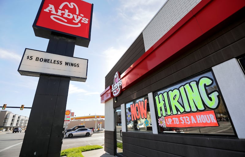 A “Now hiring” sign is pictured at an Arby’s in Salt Lake City, Utah.