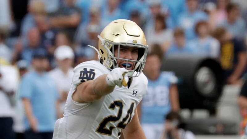 Notre Dame linebacker Jack Kiser directs a play during game against North Carolina in Chapel Hill, N.C., Sept. 24, 2022.