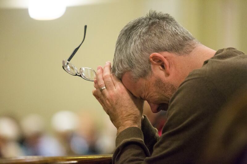 Mark Annie, of Salt Lake City, bows his head during Bishop Karen Oliveto sermon at First United Methodist Church in Salt Lake City on Sunday, Jan. 13, 2019. In February, leaders of the United Methodist Church will meet to decide how to approach ordination