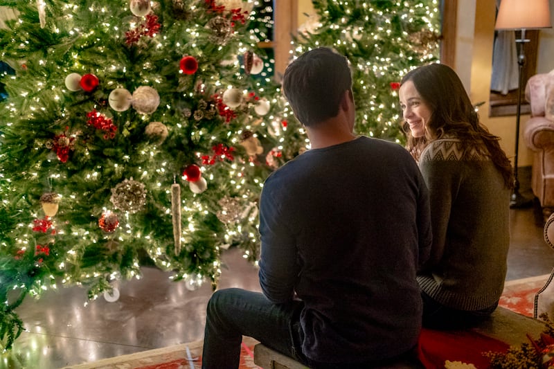Joy Holbrook (Danielle Panabaker) and Matt Long (Ben Andrews) in the Hallmark Channel film “Christmas Joy.”