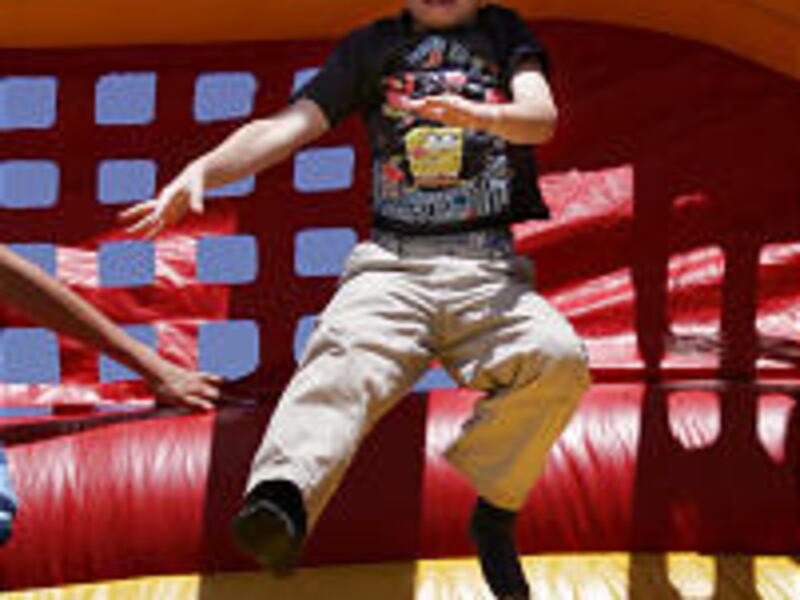 Cody Cory enjoys play area in the newly expanded emergency room.