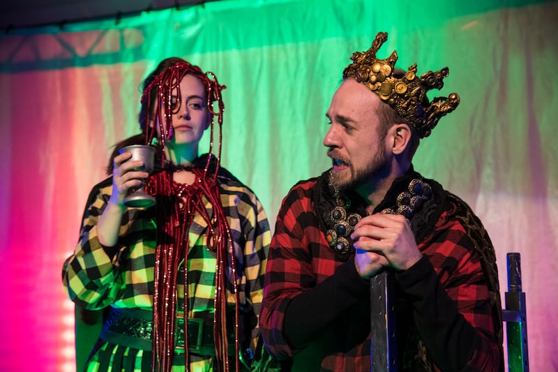 Macbeth (Tim Sailer, foreground) is taunted by his hallucination of Banquo (Karen Thorla, background).