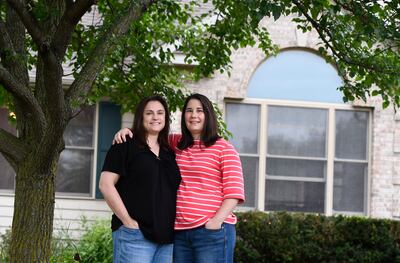 Married couple Dana and Kristy Dumont are pictured at their home in Dimondale, Mich., on Tuesday June 19, 2018. The Dumonts hope to be able to adopt children together