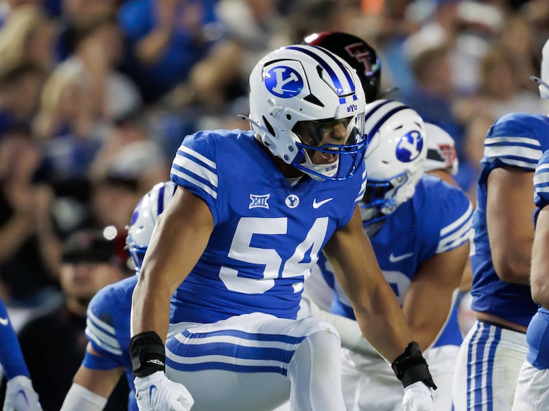 BYU linebacker Siale Esera reacts after a big play against Texas Tech on Oct. 21, 2023.