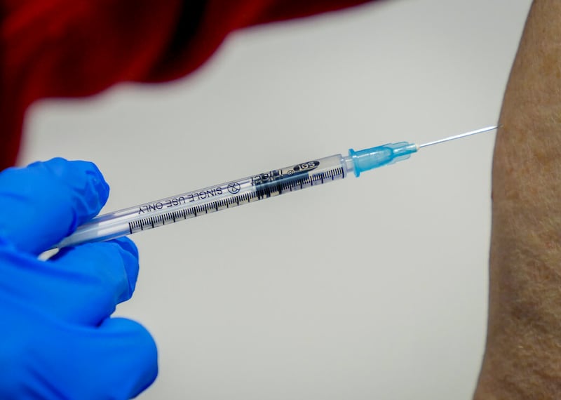 A man gets his booster shot at the vaccination center in Frankfurt, Germany.