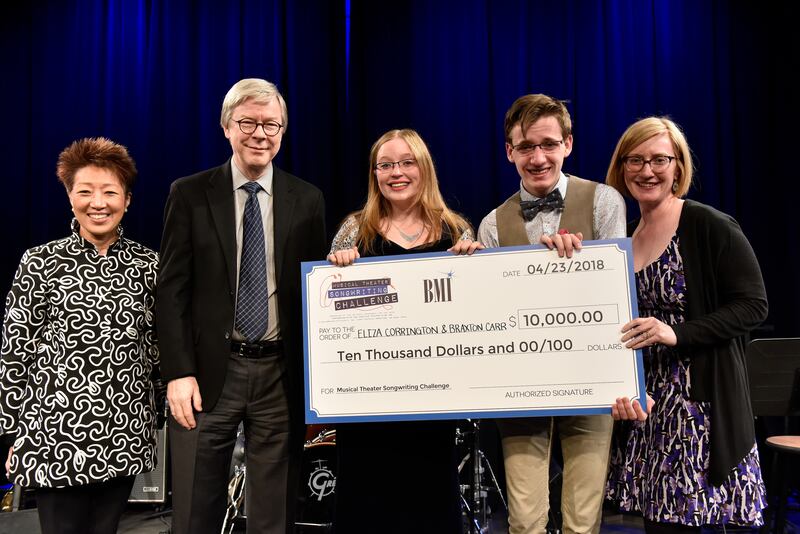 Eliza Corrington and Braxton Carr hold their second place prize of $10,000 at the final competition for the Musical Theater Songwriting Challenge, an initiative of the National Endowment for the Arts in partnership with the American Theatre Wing.