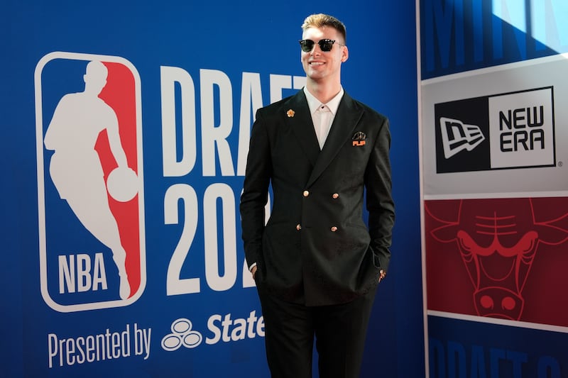 Kyle Filipowski walks the red carpet before the NBA basketball draft, Wednesday, June 26, 2024, in New York.