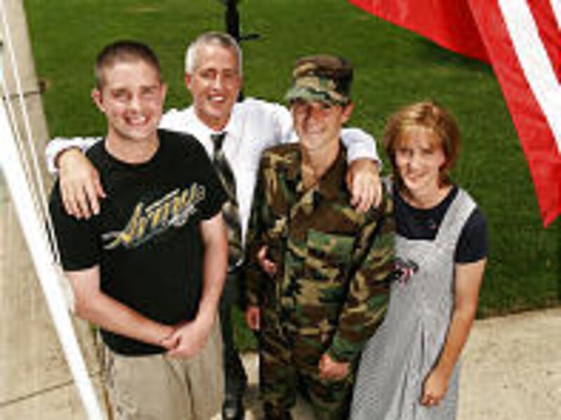 Stephen and Tamara Taylor join sons Matt, left, and Devin at their South Ogden home.