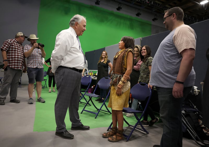 Elder Ronald A. Rasband, of the Quorum of the Twelve Apostles, speaks with Jeremiah Rowbury.