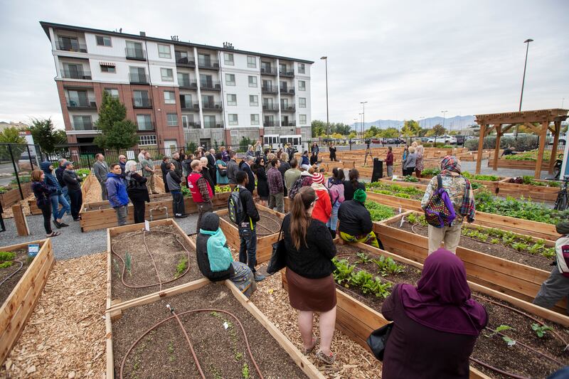 Salt Lake City Mayor Jackie Biskupski helps unveil the city's newest community garden in the Gateway area on Tuesday, Oct. 9, 2018.