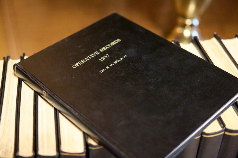 The volume of President Russell M. Nelson’s operative records from 1957 is shown in a photograph from Aug. 30, 2023.