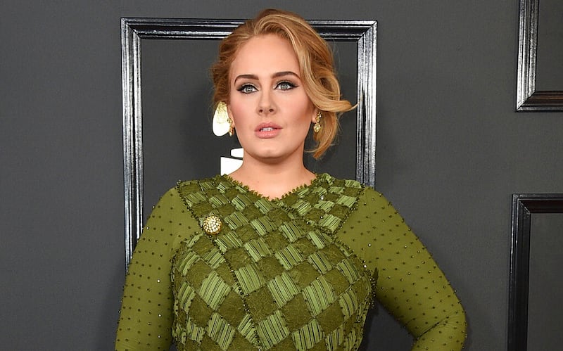 Adele arrives at the 59th annual Grammy Awards in Los Angeles.