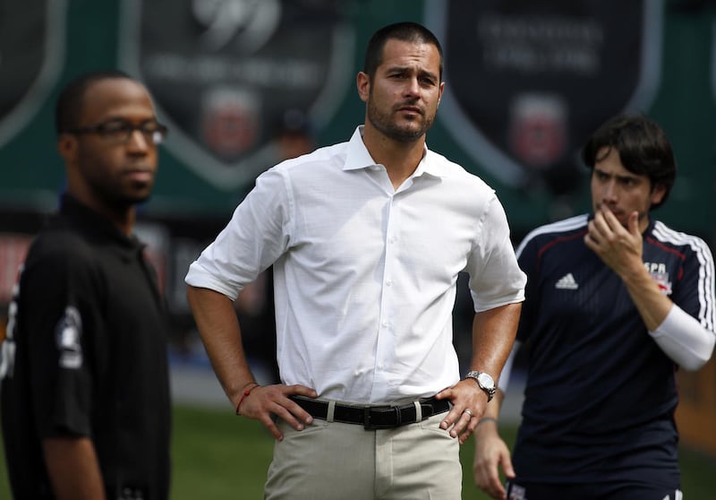 New York Red Bulls head coach Mike Petke stands near the bench before an MLS soccer match against the D.C. United , at RFK Stadium, Sunday, Aug. 31, 2014, in Washington. (AP Photo/Alex Brandon)