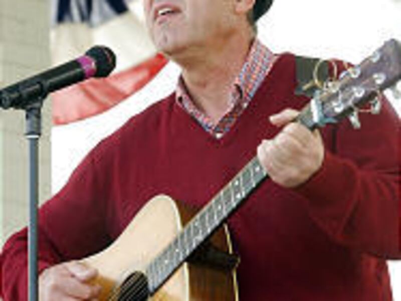 Brian Fetzer, a math teacher who turns mathematics into melodies, performs at the Utah State Fair.