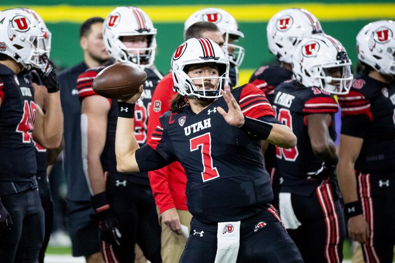 Utah Utes quarterback Cameron Rising (7) warms up before the Utes face the Oregon Ducks in the Pac-12 championship game.