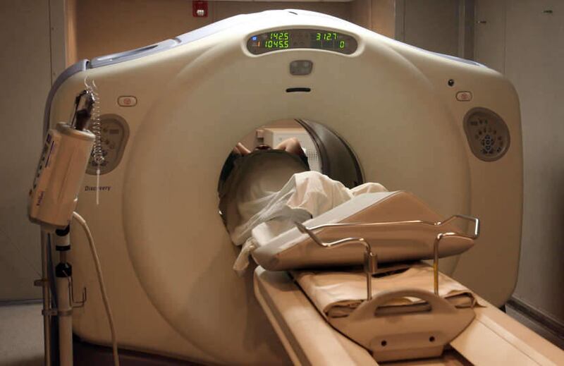 Radiology technician Kevin Schaeffer performs a PET/CT scan on a patient in a mobile clinic outside American Fork Hospital Wednesday, October 25, 2006. The IHC facility is built into a tractor trailer and is stationed throughout Utah on different days of